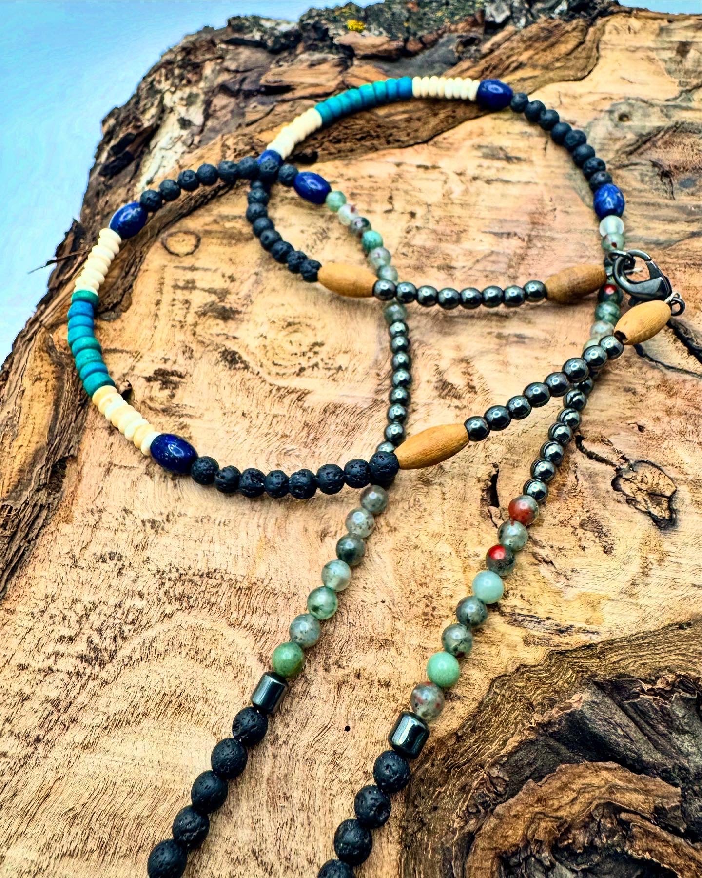 Guardian of Strength – Hematite Lion Necklace with African Blood Agate, Lapis Lazuli, Lava Stone, Shell & Wood